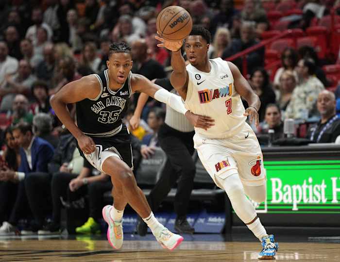 Miami Heat guard Kyle Lowry in a game against the San Antonio Spurs, guarded by Romeo Langford.